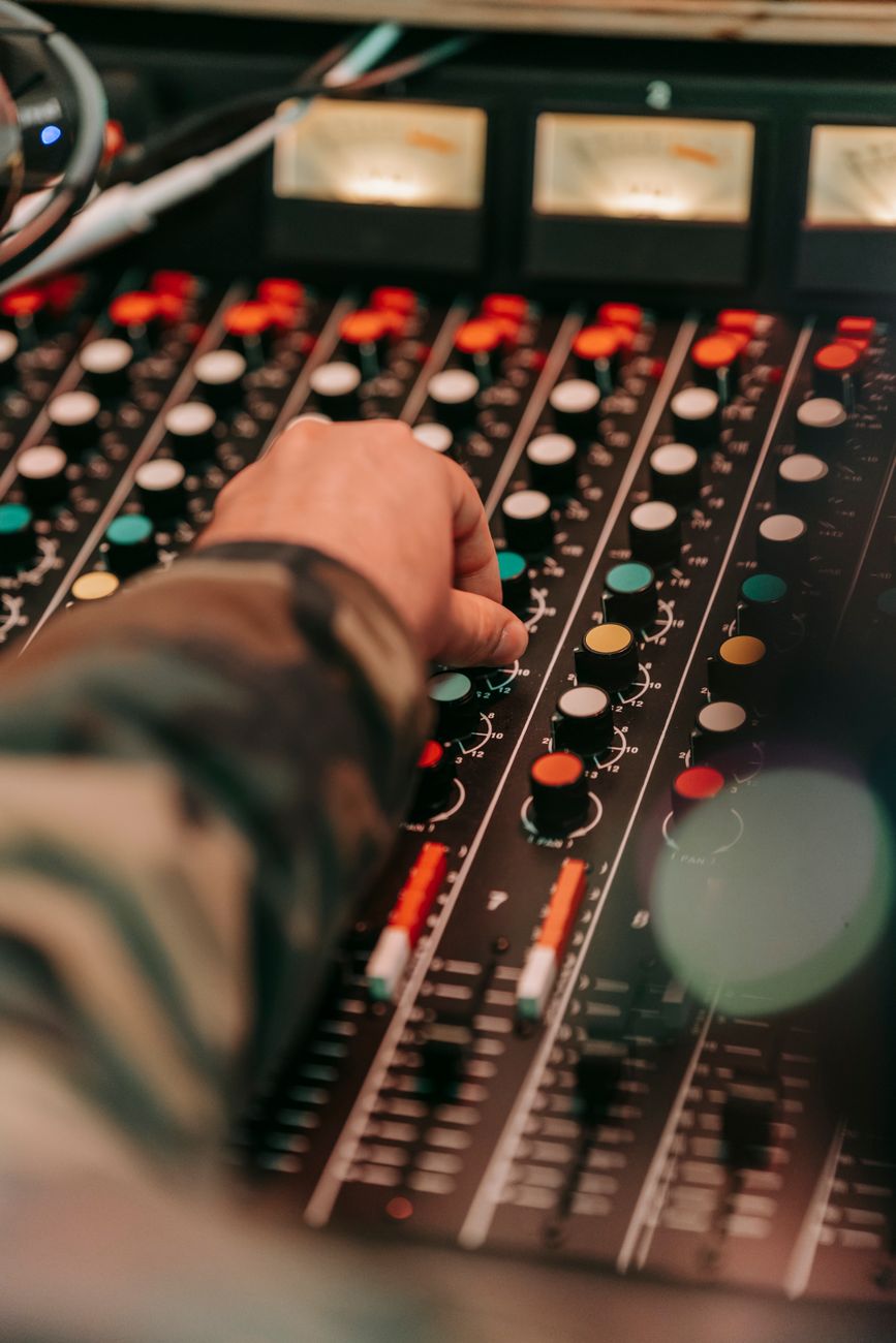 Audio Engineer working on professional console